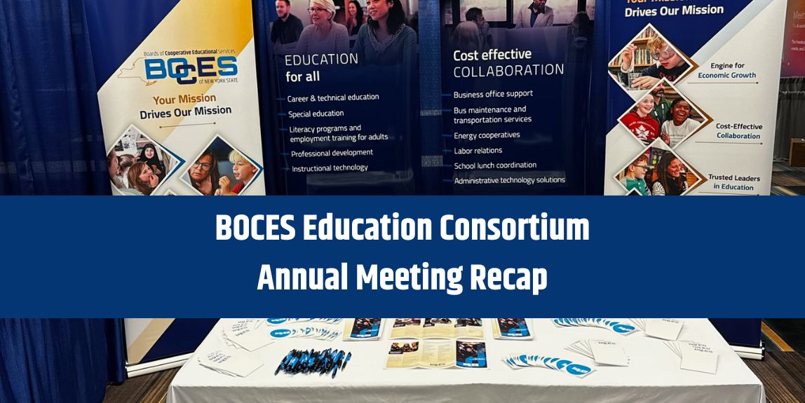 A table is shown with BOCES of NYS pamphlets, pens, stickers, notepads, along with an informative display of information about BOCES of NYS mission presented on a banner stand.